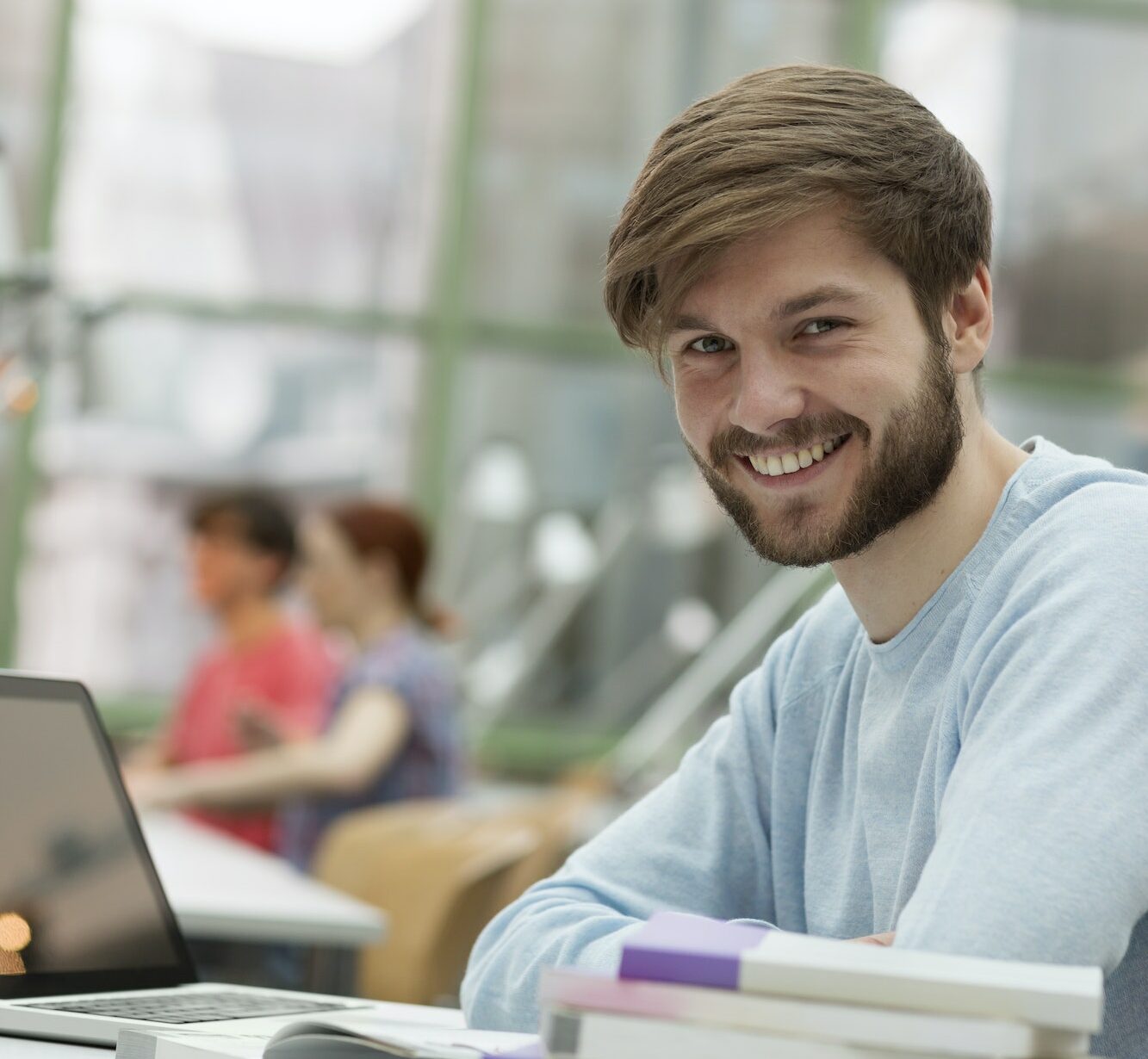 Portrait of student learning in a university library
